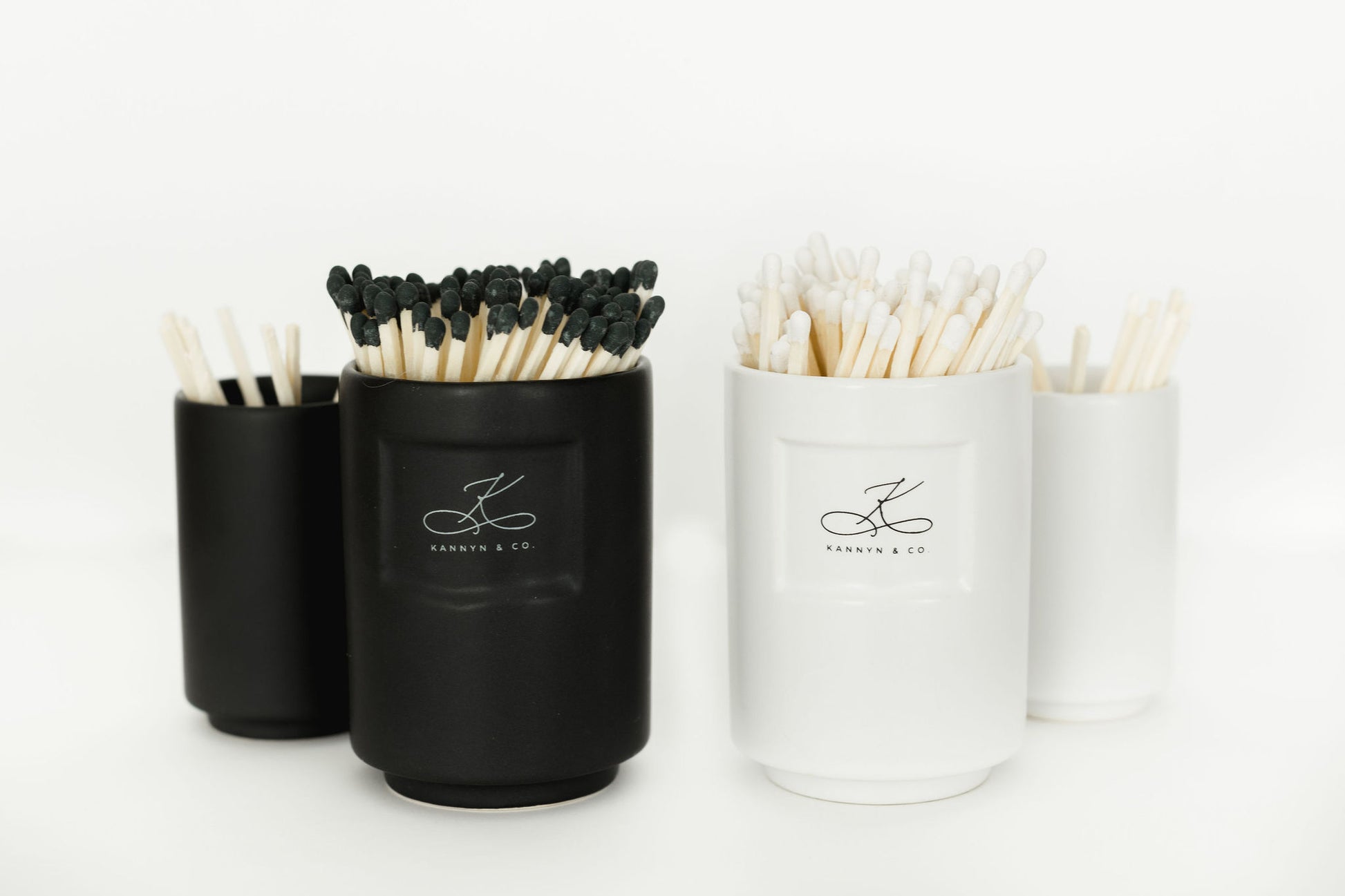 Photo of Match holder set in both Black and White varients